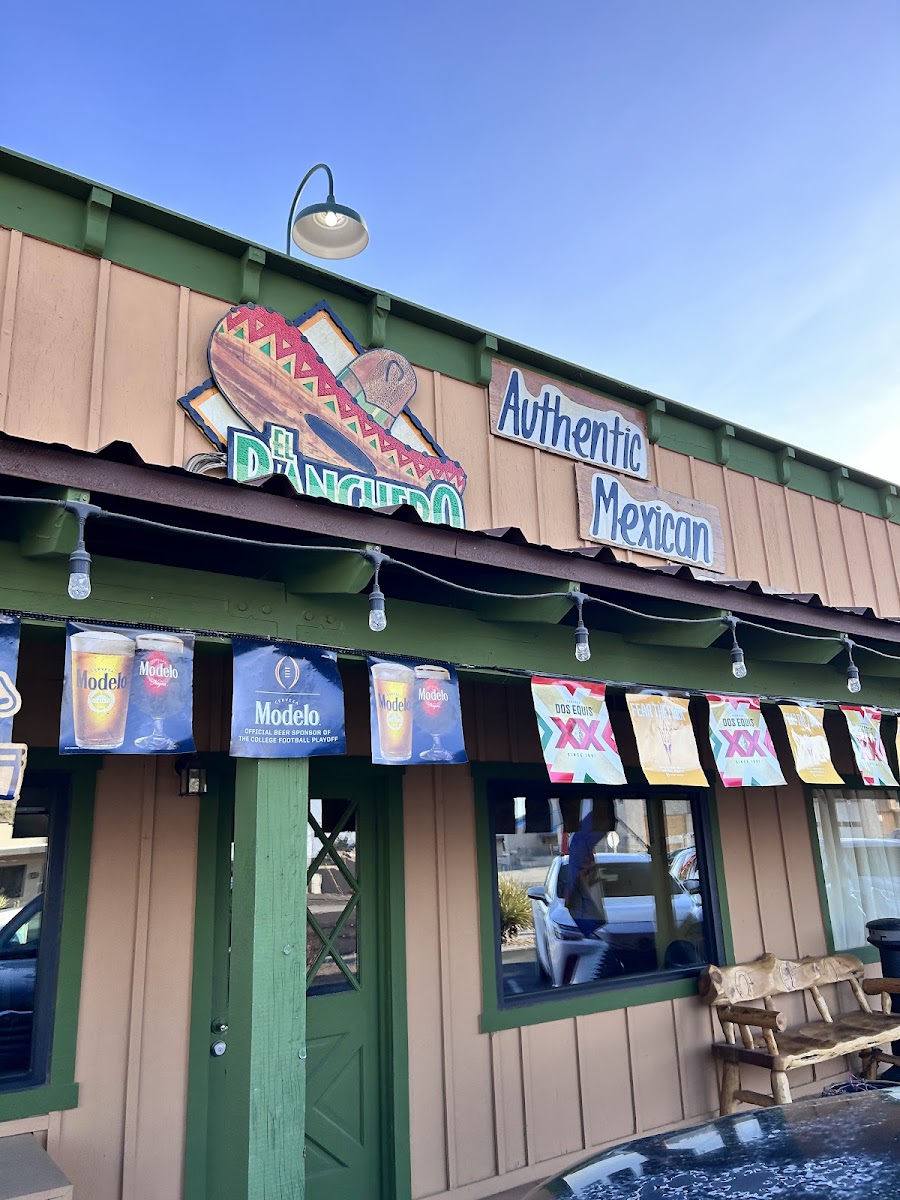 El Ranchero's hand-painted sombrero sign over the front patio in Wickenburg